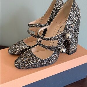 No. 21 Black and Gold Glitter Triple-Strap Mary Jane Pumps